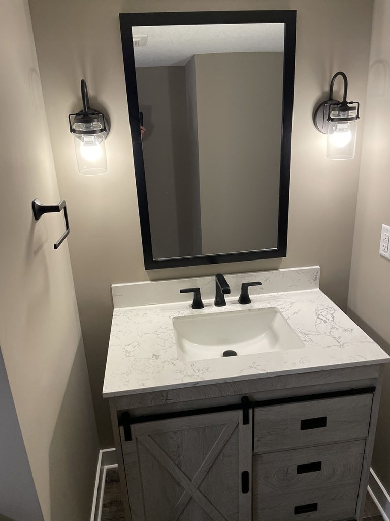 After picture of finished, modern basement bathroom project in Southeast metro, MN.